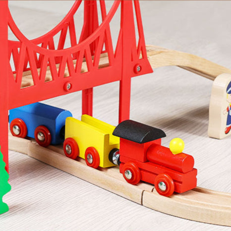 Wooden train set with red bridge and colorful trains