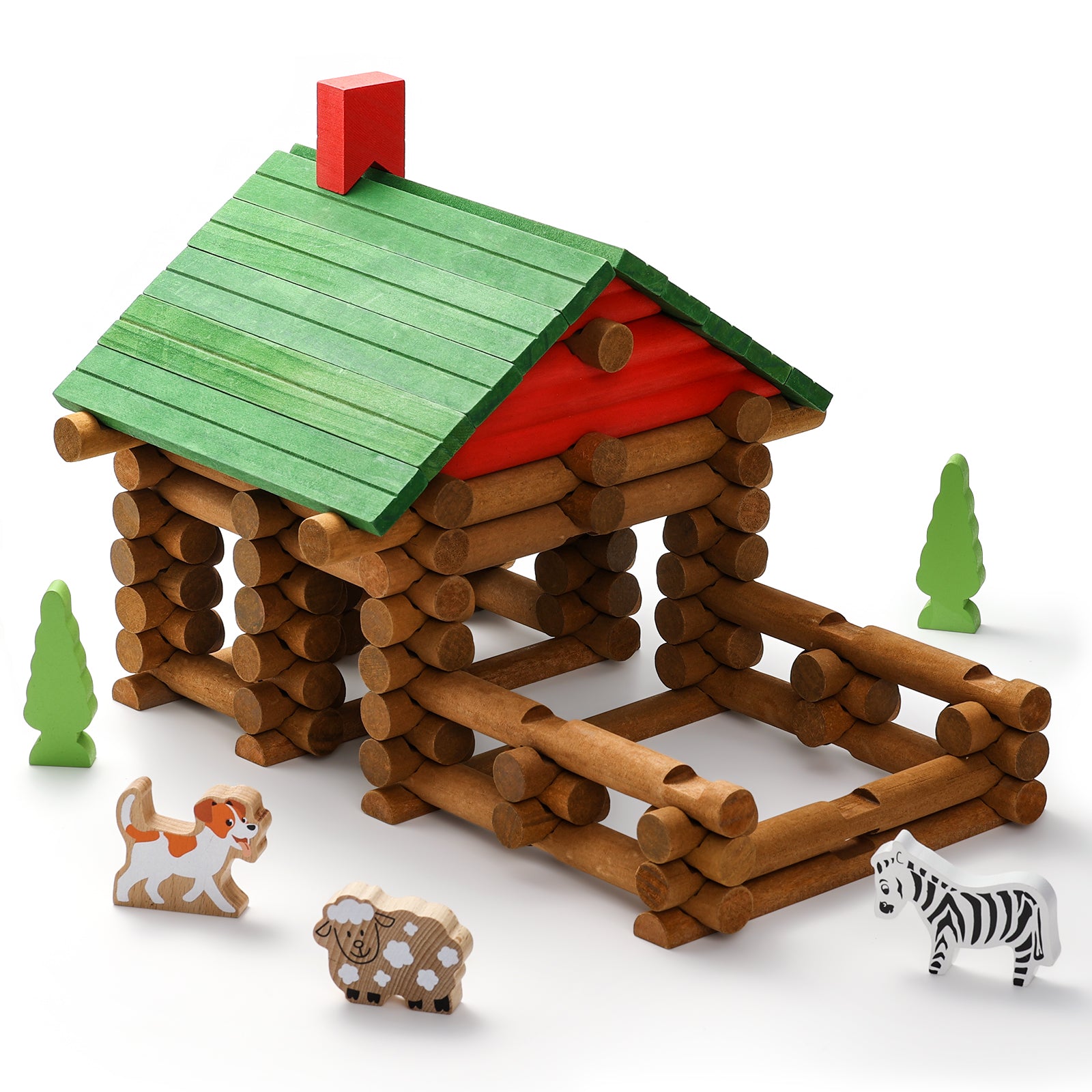 Toy log cabin with a green roof and red chimney, surrounded by small animal figures and trees