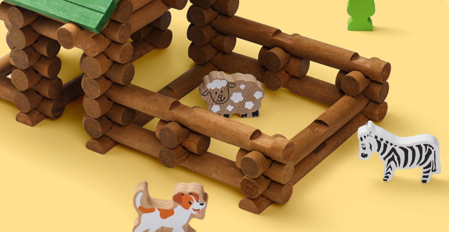 Children's toy set with wooden block structures and animal figures