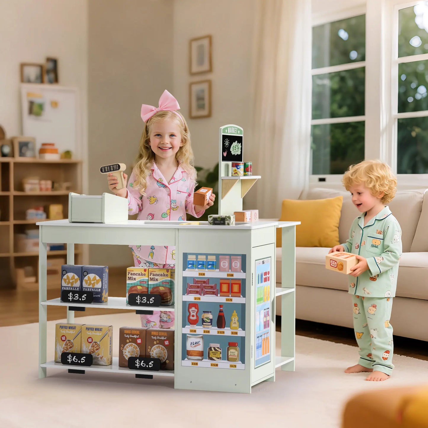 Two children playing with a toy kitchen set in a living room.