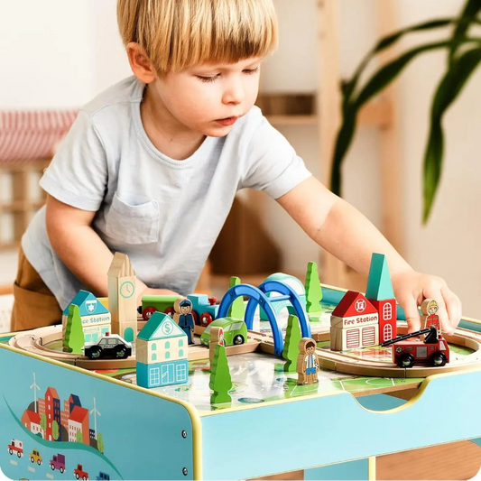 Child playing with wooden toys on a table in a bright room