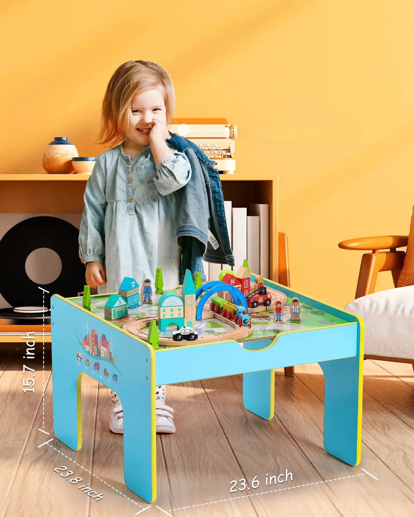 Child playing with a colorful train toy table