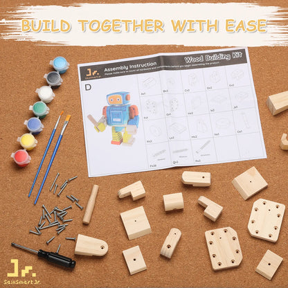 Wood building kit with wooden pieces, screws, paint, brushes, and assembly instructions on a cork board.