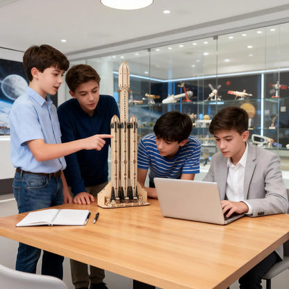 Four children around a table with a model rocket