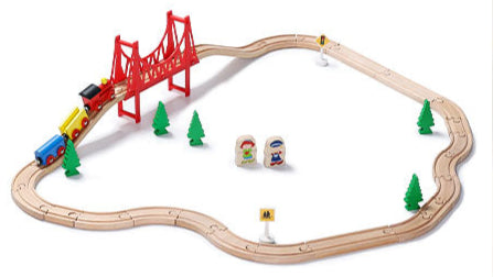 Wooden train set with different layout plans displayed