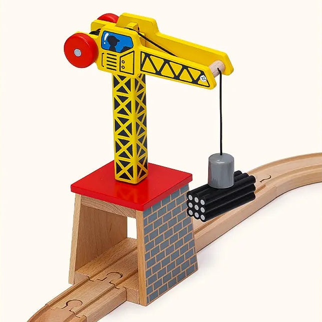 Toy train track set with various pieces and a crane, featuring text 'Endless Stories on Track'.