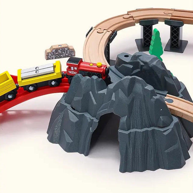 Toy train track set with various pieces and a crane, featuring text 'Endless Stories on Track'.