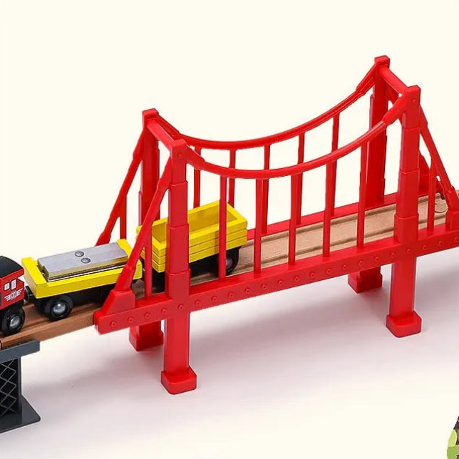 Toy train track set with various pieces and a crane, featuring text 'Endless Stories on Track'.