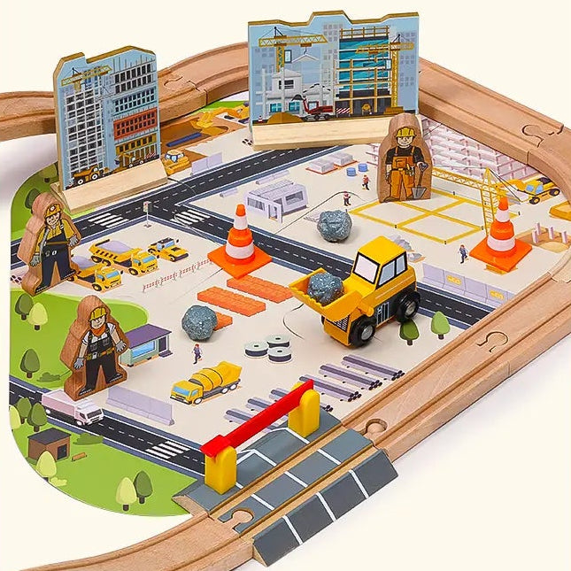 Toy train track set with various pieces and a crane, featuring text 'Endless Stories on Track'.