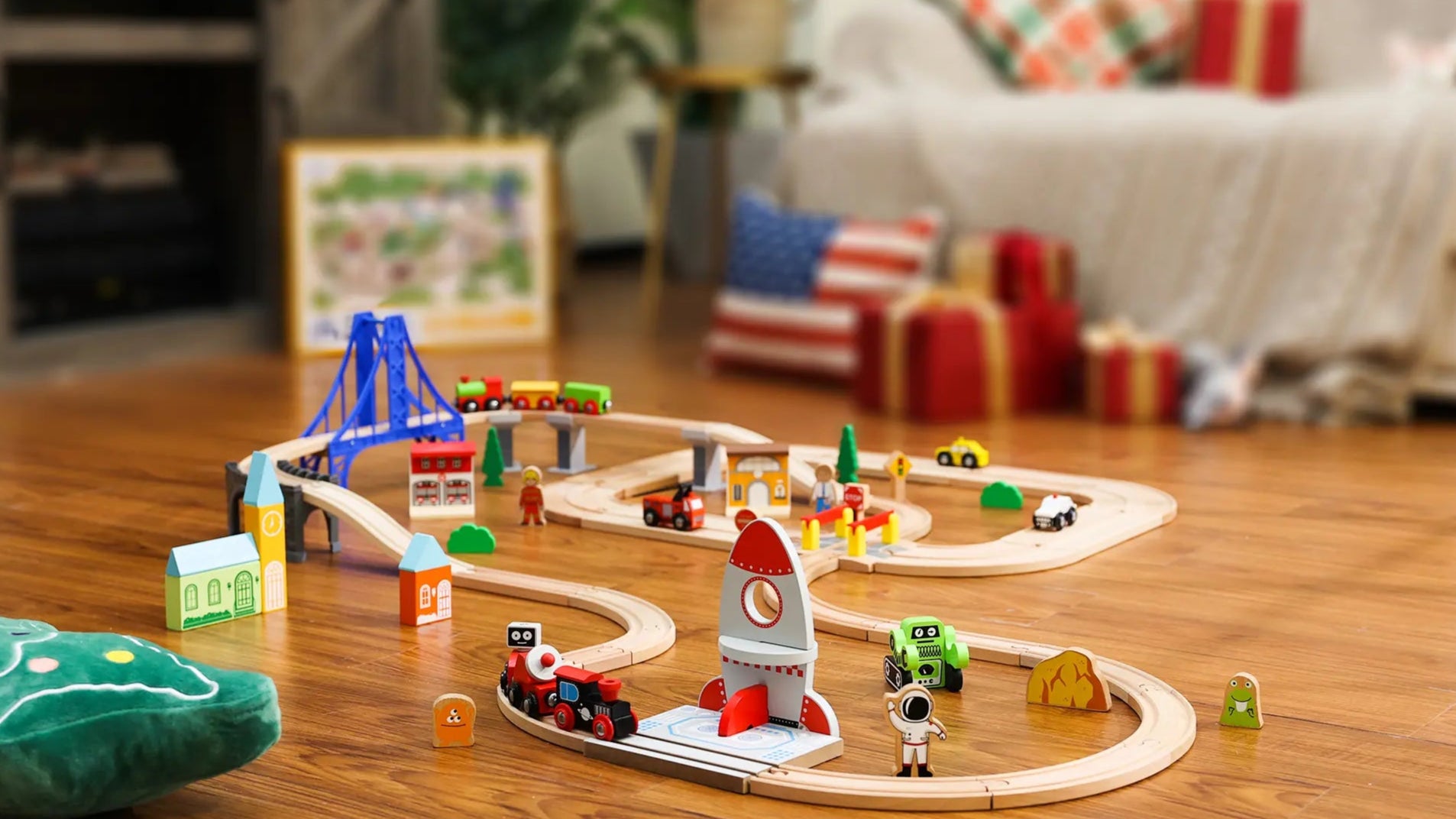 Toy train set with a rocket on a wooden track