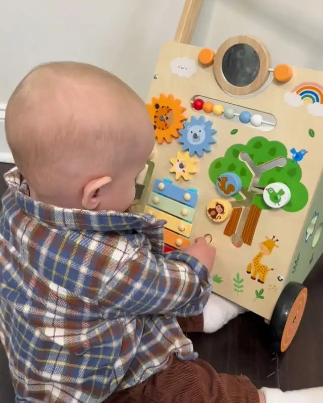 Child playing with a wooden educational toy