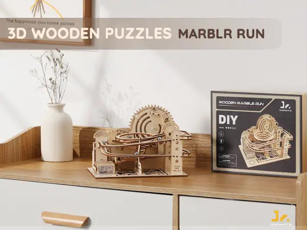 3D wooden puzzle marblr run set on a table with packaging