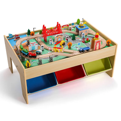 Toy train set on a wooden table with colorful bins underneath