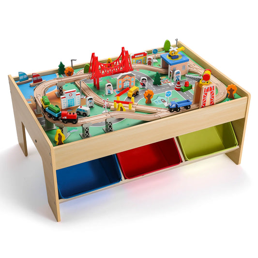 Toy train set on a wooden table with colorful bins underneath