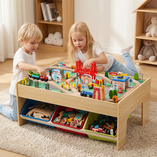 Two children playing with a wooden toy train set on a tables.