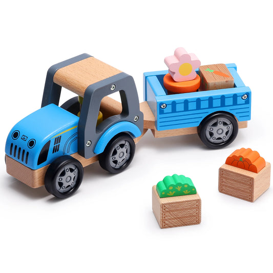 Wooden toy truck with a blue body and wooden trailer, carrying colorful blocks