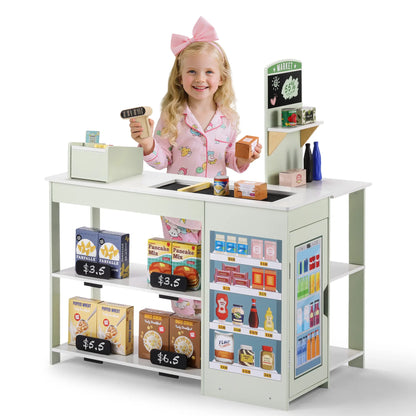 Child playing with a toy kitchen set