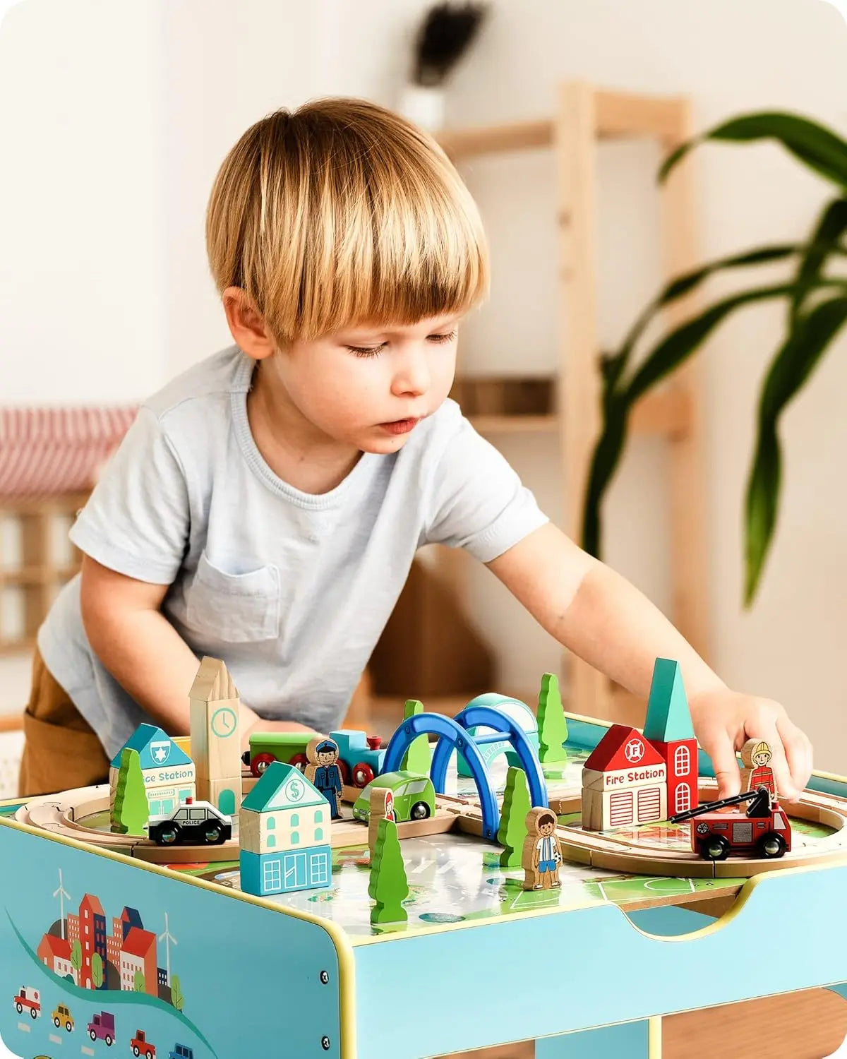 Child playing with wooden toys on a table in a bright room