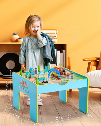 Child playing with a colorful train toy table