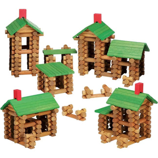Set of wooden lincoln logs cabins with green roofs