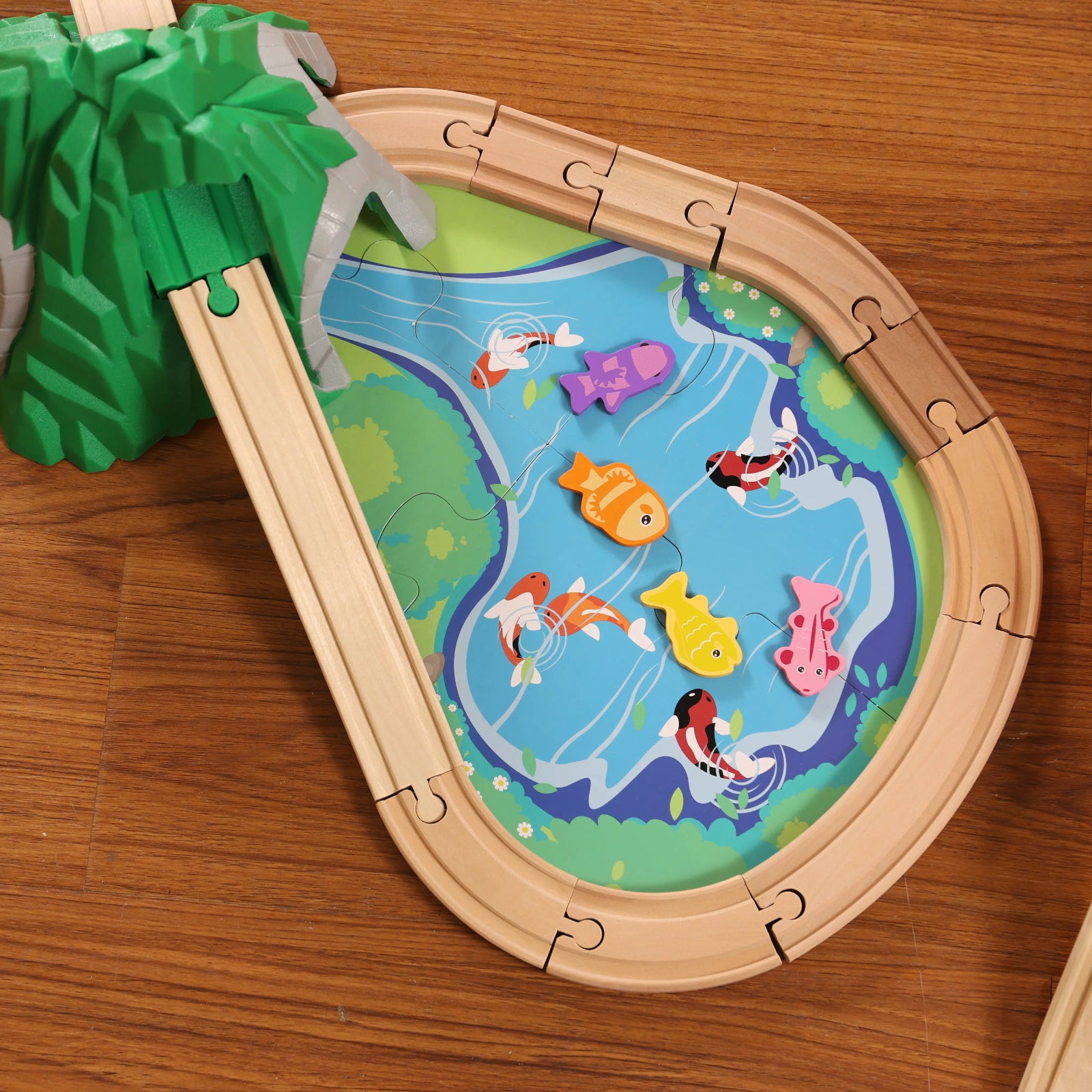 Wooden fishing game with colorful fish and a lake design-wooden train