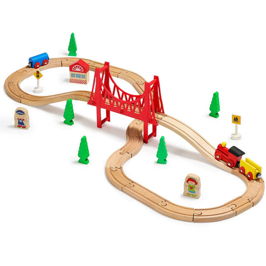 Toy train set with wooden tracks, red bridge, and colorful trains