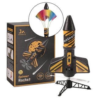 Spinner rocket toy with packaging and close-up of rainbow-colored umbrella